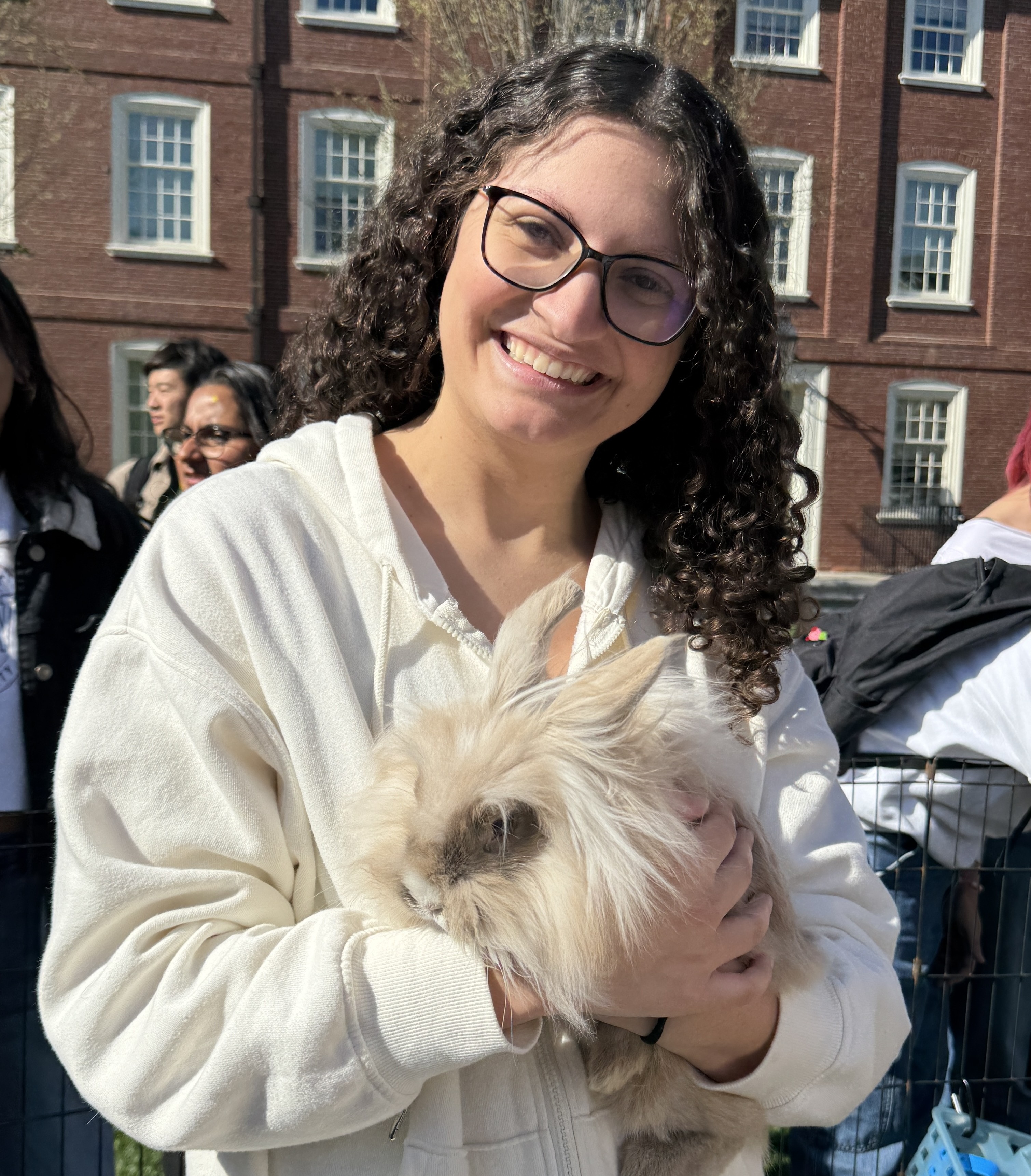 Profile image of Sana holding a bunny
